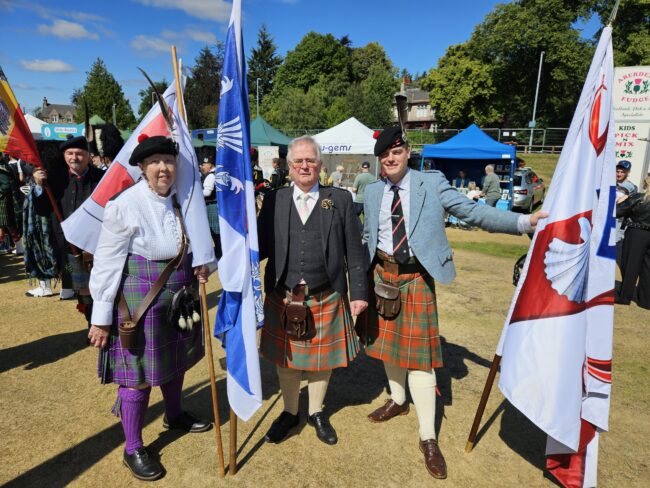 Alan, John and Pam with our flags